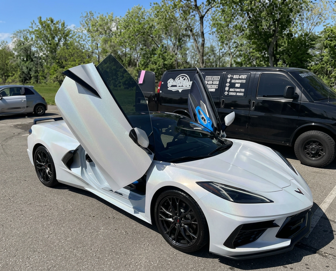 White Corvette with lambo doors after detail